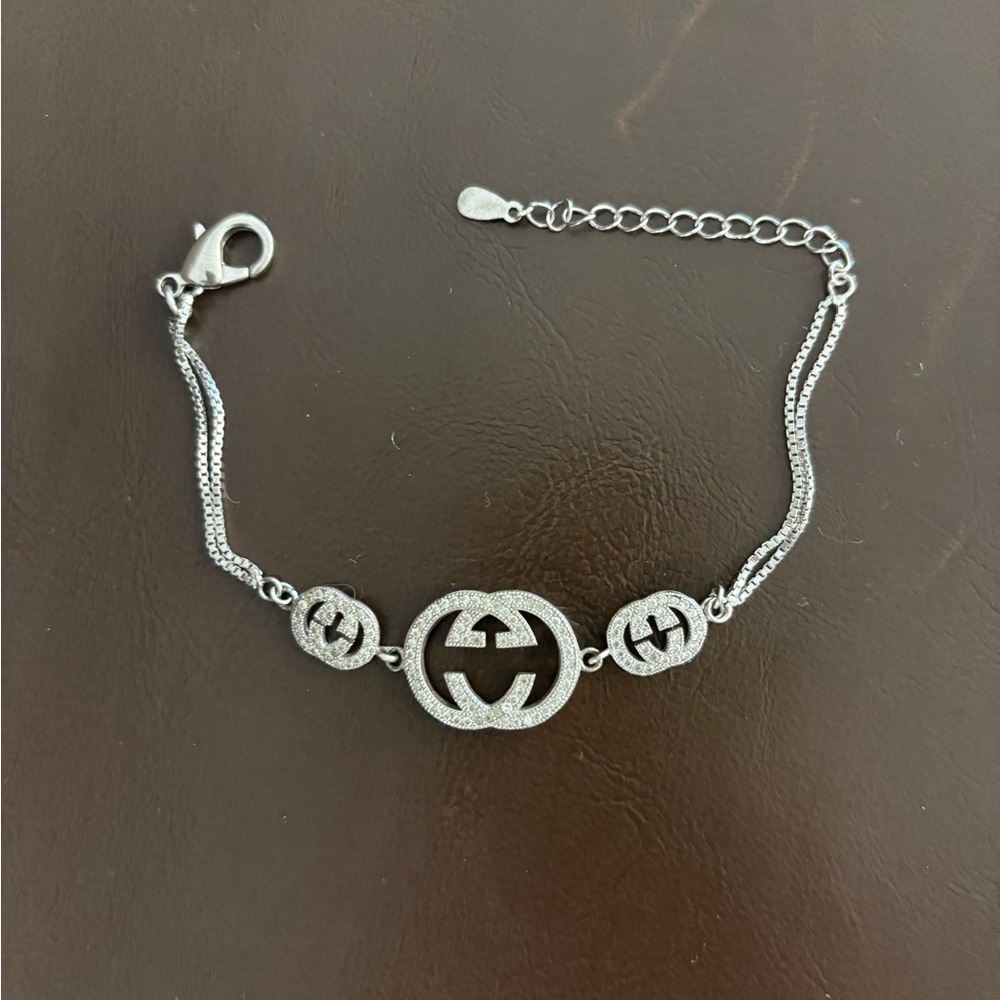 Silver Logo Charm Bracelet